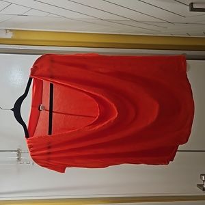 Free People orange/red short sleeved top.